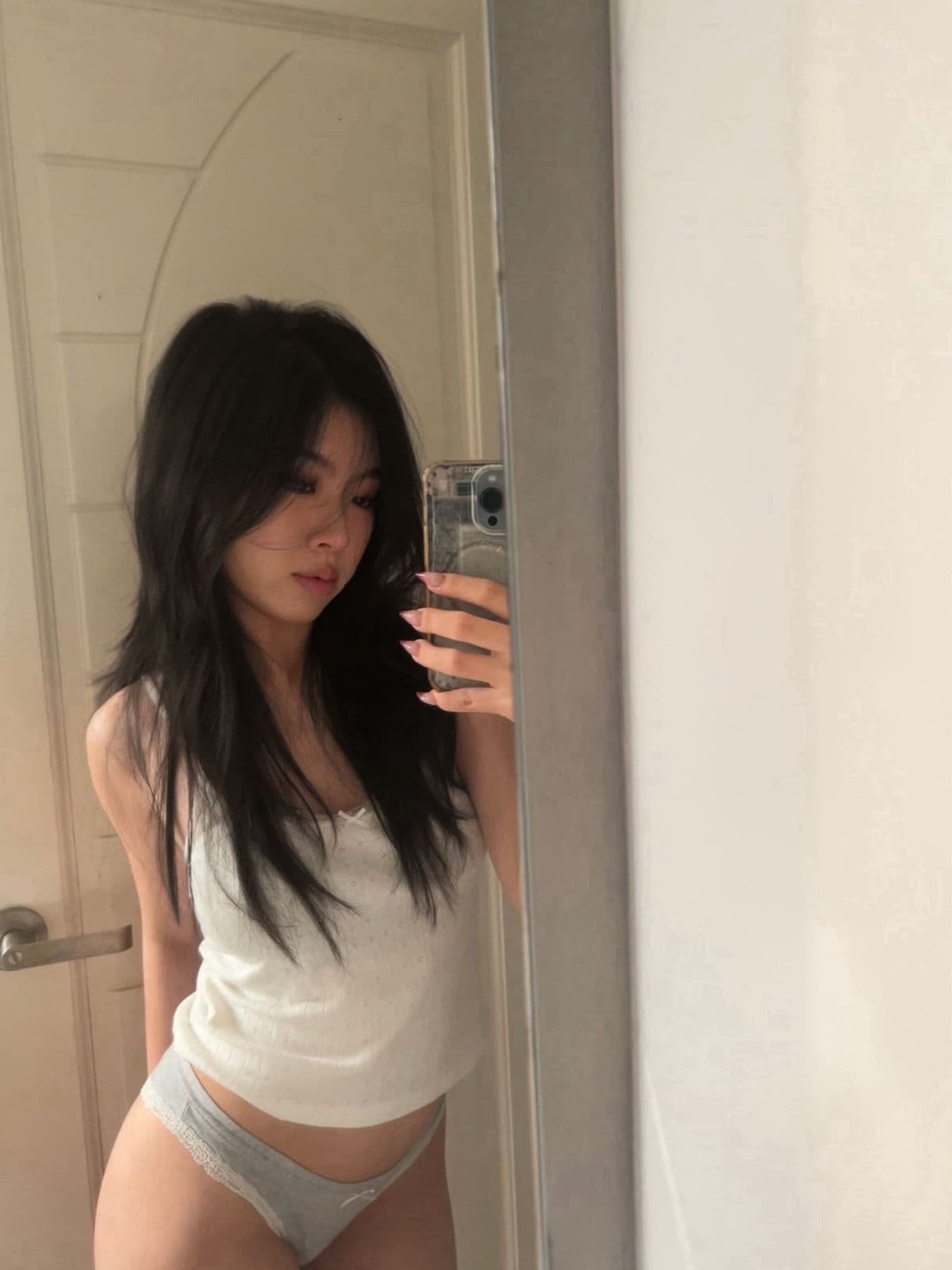 mirror selfie in white top